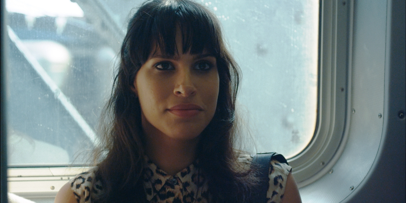 Desiree Akhavan sits on a New York subway. 