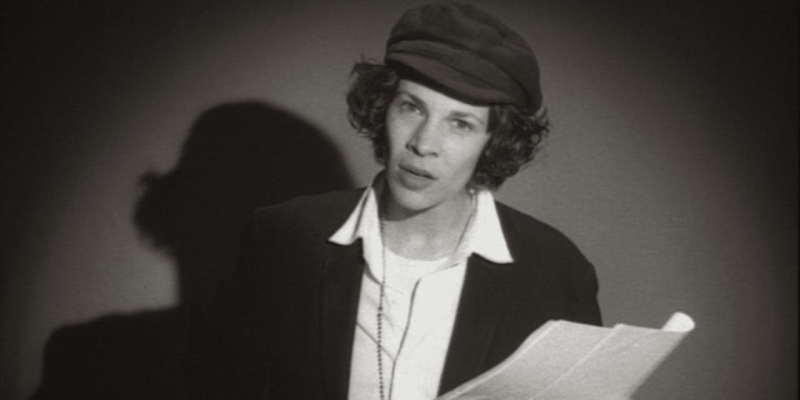 Lili Taylor as Valerie Solonas looks at the camera.