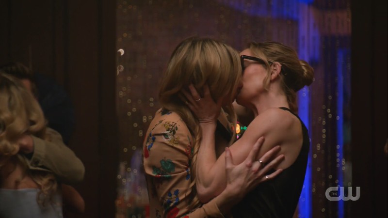 ava and sara share a victory kiss