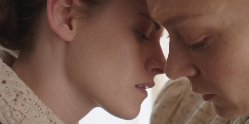 Kristen Stewart and Chloe Sevigny kiss in period clothing.