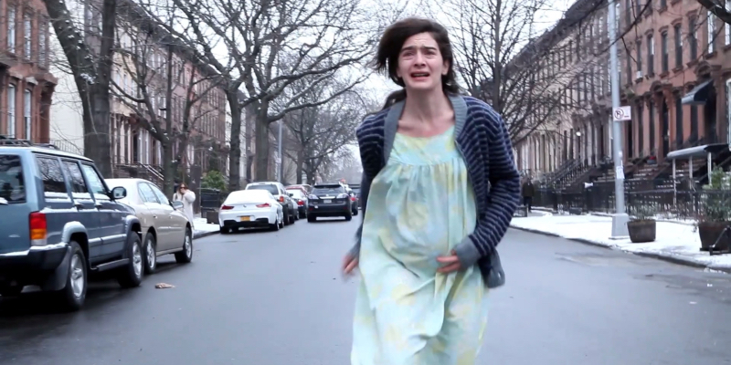 Gaby Hoffman runs down a Brooklyn street pregnant and crying.