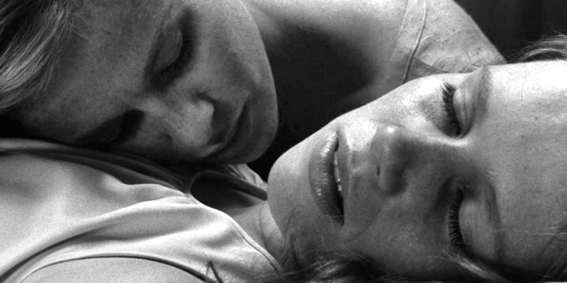 Bibi Andersson rests her head on Liv Ullmann's chest.