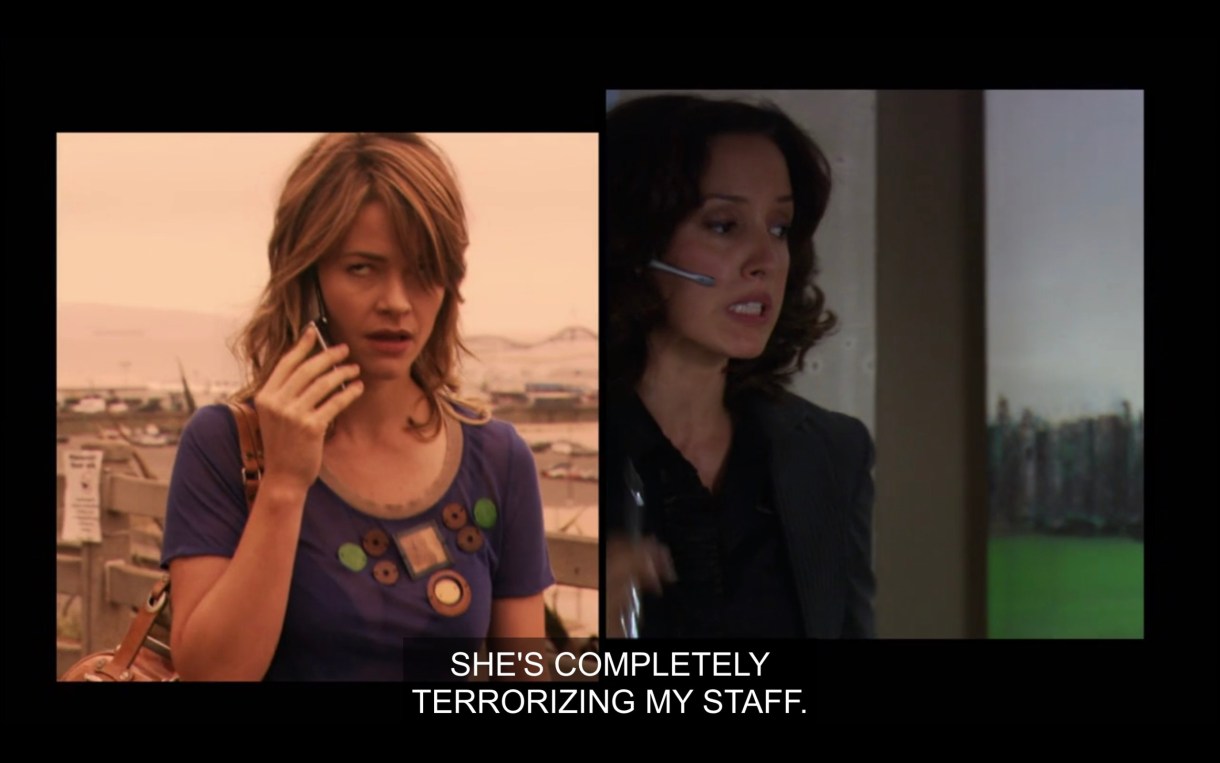 Side by side visual of Alice and Bette talking to each other on the phone. Alice is wearing a purple top and is holding her cell phone to her ear. Bette is in a black blazer and talking into a headset. "She's completely terrorizing my staff."