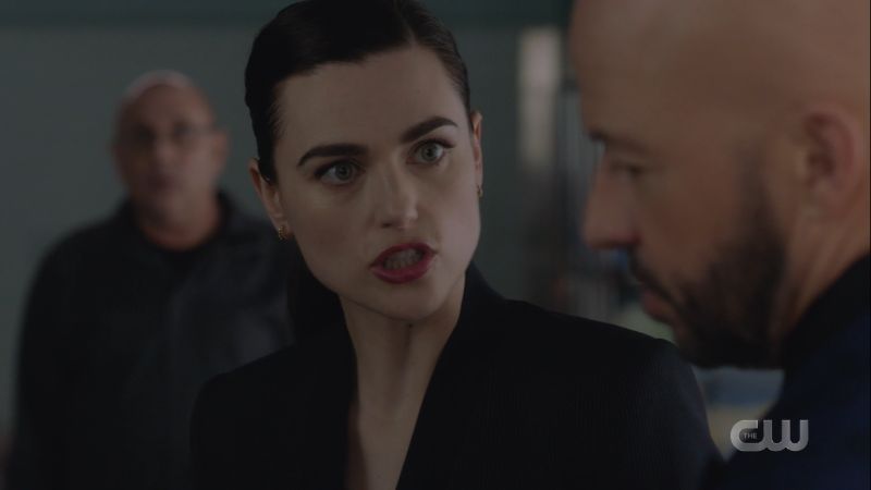 lena is yelling at lex with her lips pursed