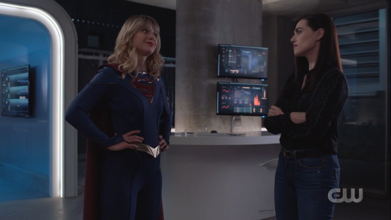 Supergirl and Lena exchange a look