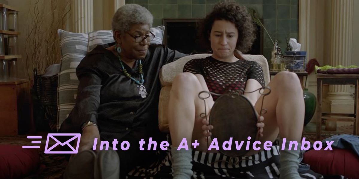 on the left, an elder therapist looks on as right, a younger client examines their genitalia in a handheld mirror, pop culture photo from Broad City