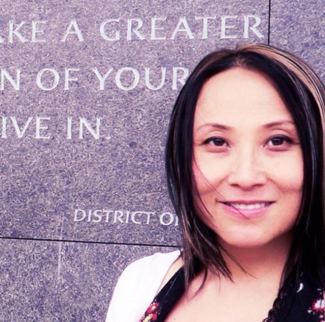 Cecilia stands in front of the Martin Luther King Jr. Memorial in Washington, D.C. 