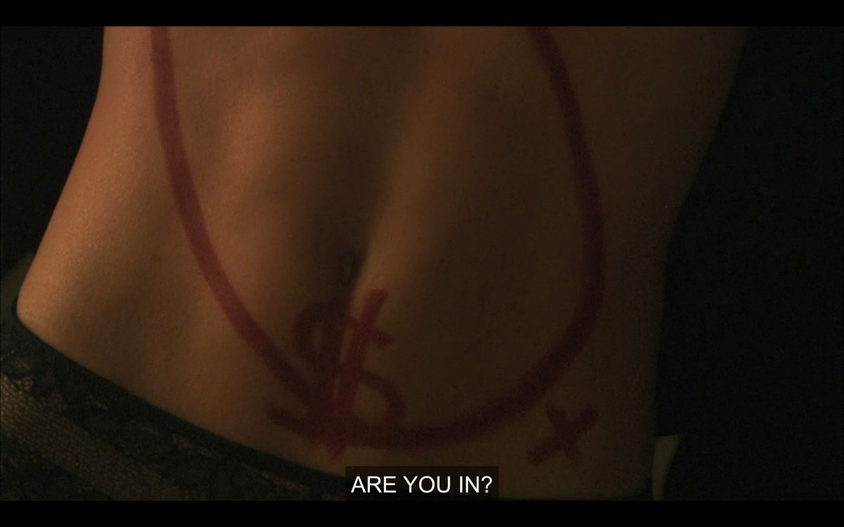 A close-up shot of someone's stomach, with a red marker drawn circle, dollar sign, and x. "Are you in?"