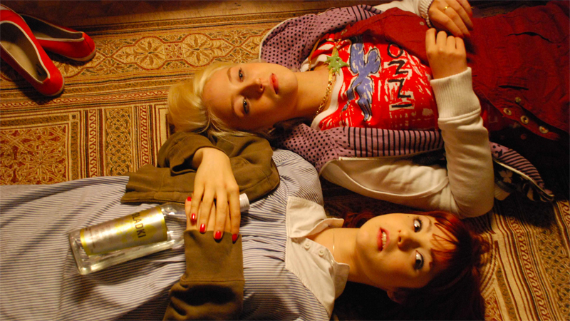 Skins: Naomi and Emily lying on the ground