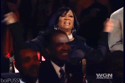 A gif of Patti LaBelle's shaking her hands in glee during a musical tribute to her life being performed by the R&B singer Fantasia.
