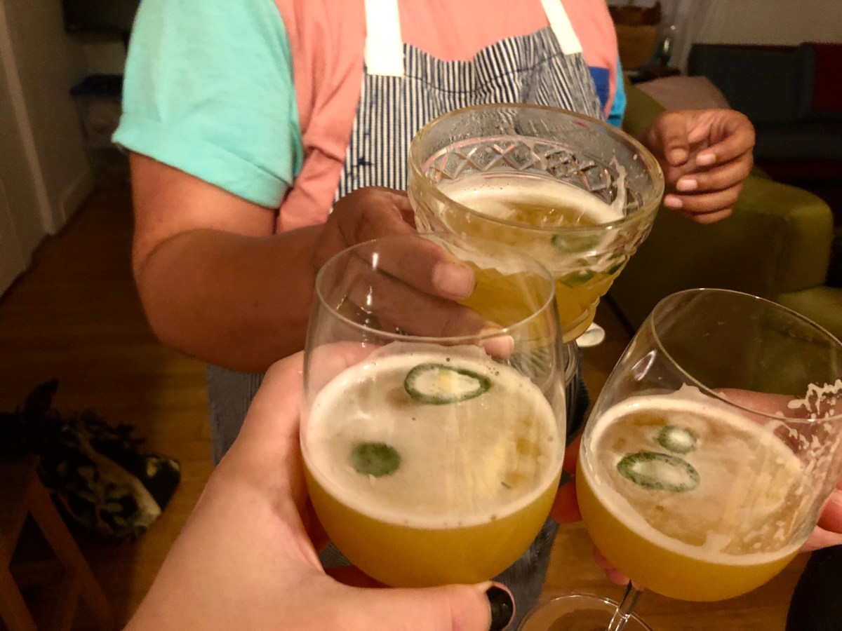 three drinks cheersing