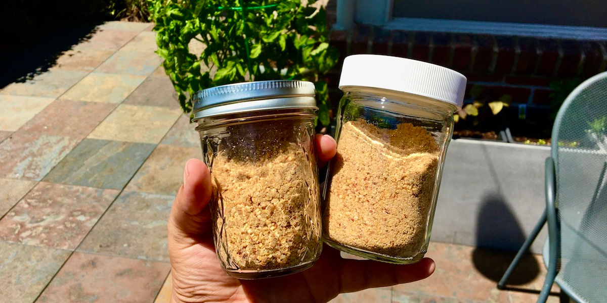 Image of two mason jars filled with a homemade South Indian spice mixture known as gunpowder (otherwise known as molaha podi).