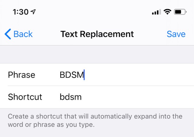 the iPhone text replacement screen. "BDSM" is entered in the phrase field and "bdsm" is entered in the shortcut field