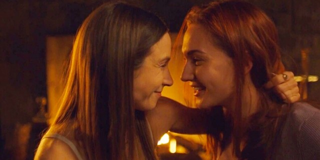 Waverly and Nicole stare lovingly at each other.