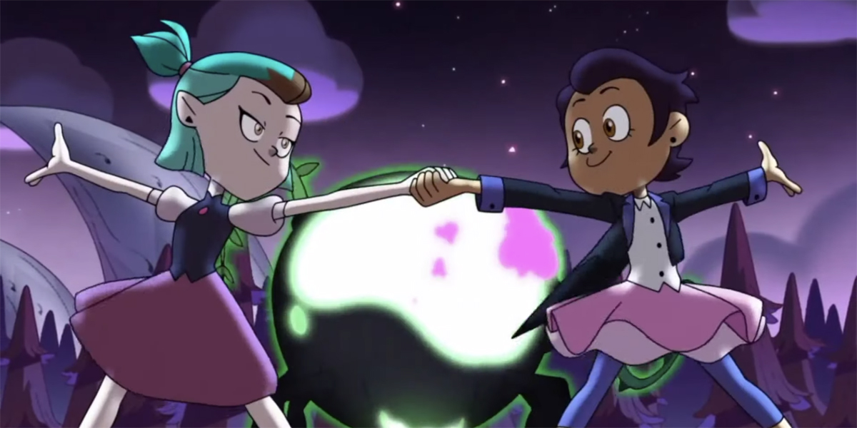 Amity and Luz dancing together in the Disney Channel animated series, Owl House.