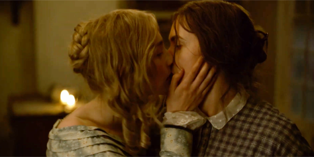 Kate Winslet and Saoirse Ronan kiss in the screener for the film Ammonite.
