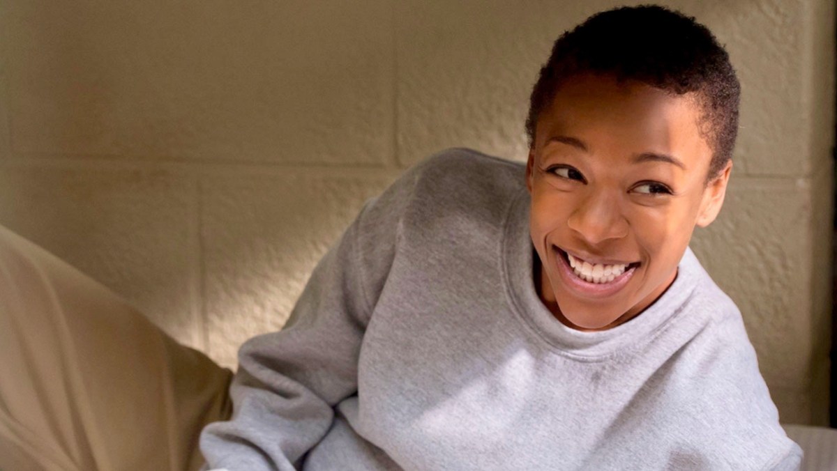 Poussey Washington from Orange is the New Black lays on her bunk and smiles at you until your stomach does flip flops because how can one person be so perfect?