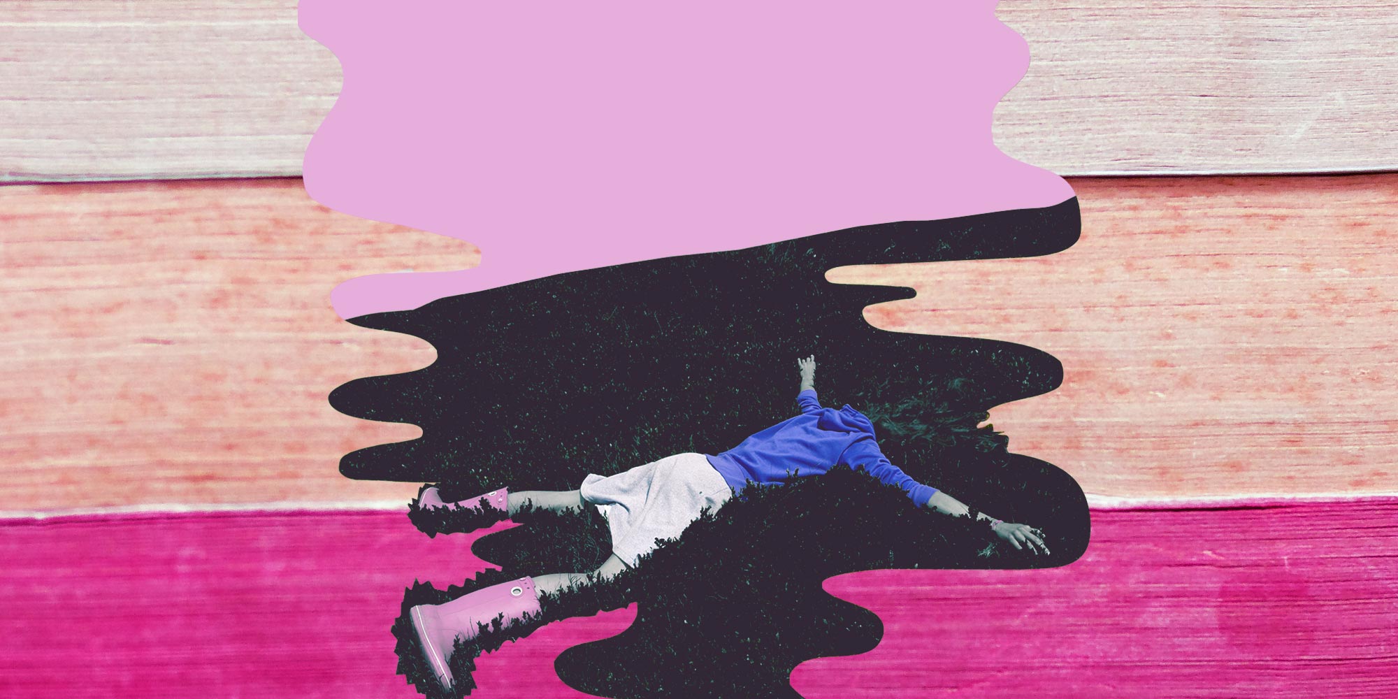 girl lying facedown in the grass