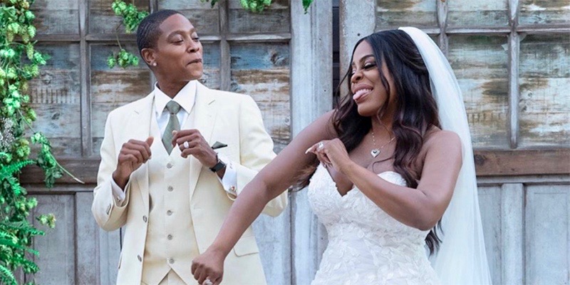 Niecy Nash and her wife Jessica Betts dancing together on their wedding day.