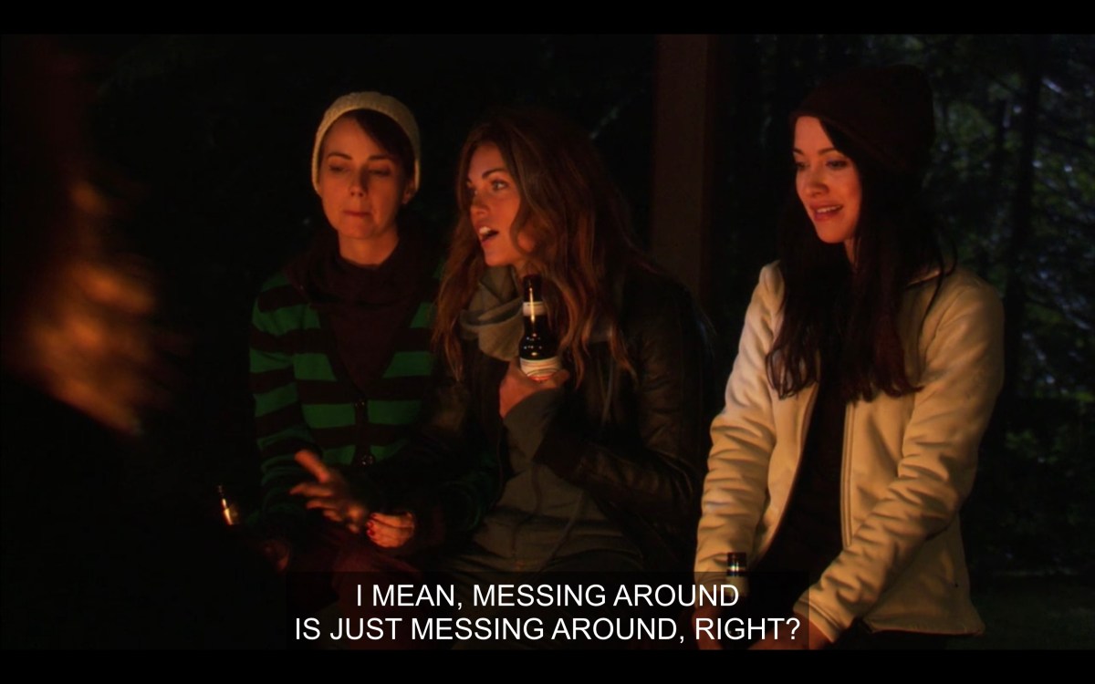 Jenny, Niki and Adele at the campfire debating what cheating is