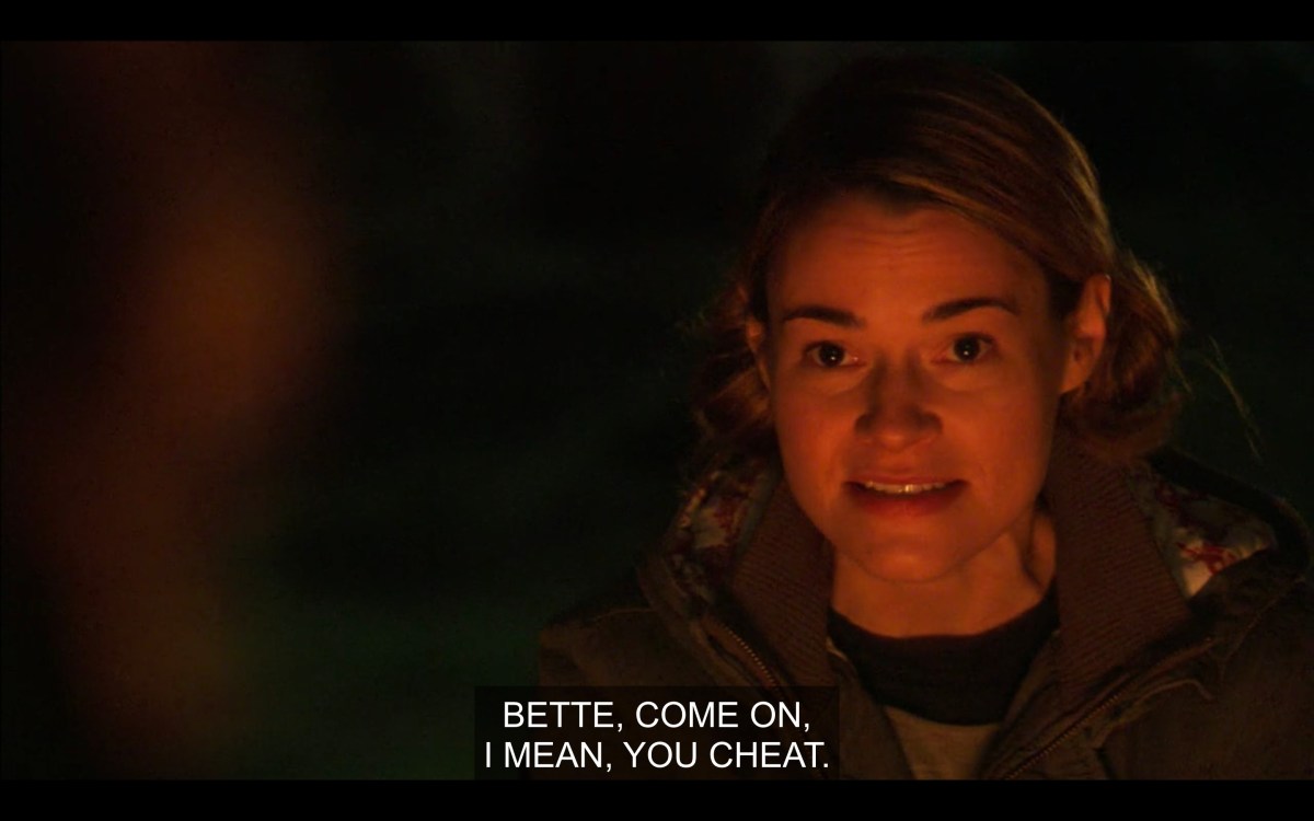 Alice at campfire saying that Bette cheats
