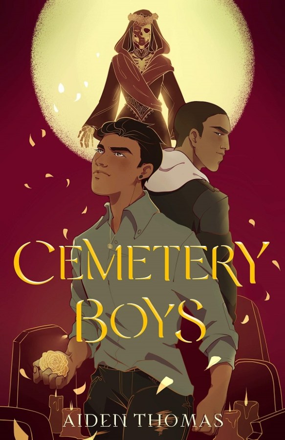 The cover image for Cemetery Boys features two boys in the foreground with serious expressions and a skeletal female witch figure hovering against the full moon in the sky behind her in the background.
