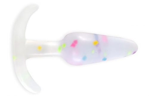 an opaque off-white butt plug with rainbow confetti through it for a funfetti look