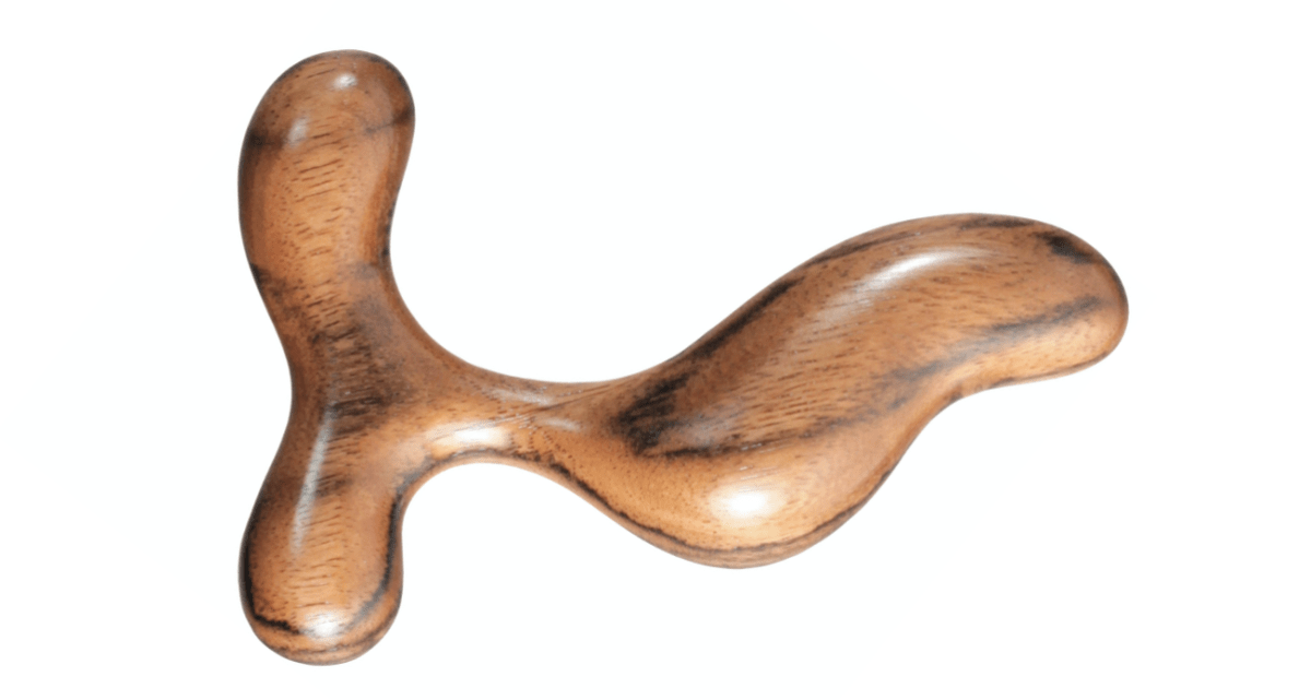 a wooden prostate massager