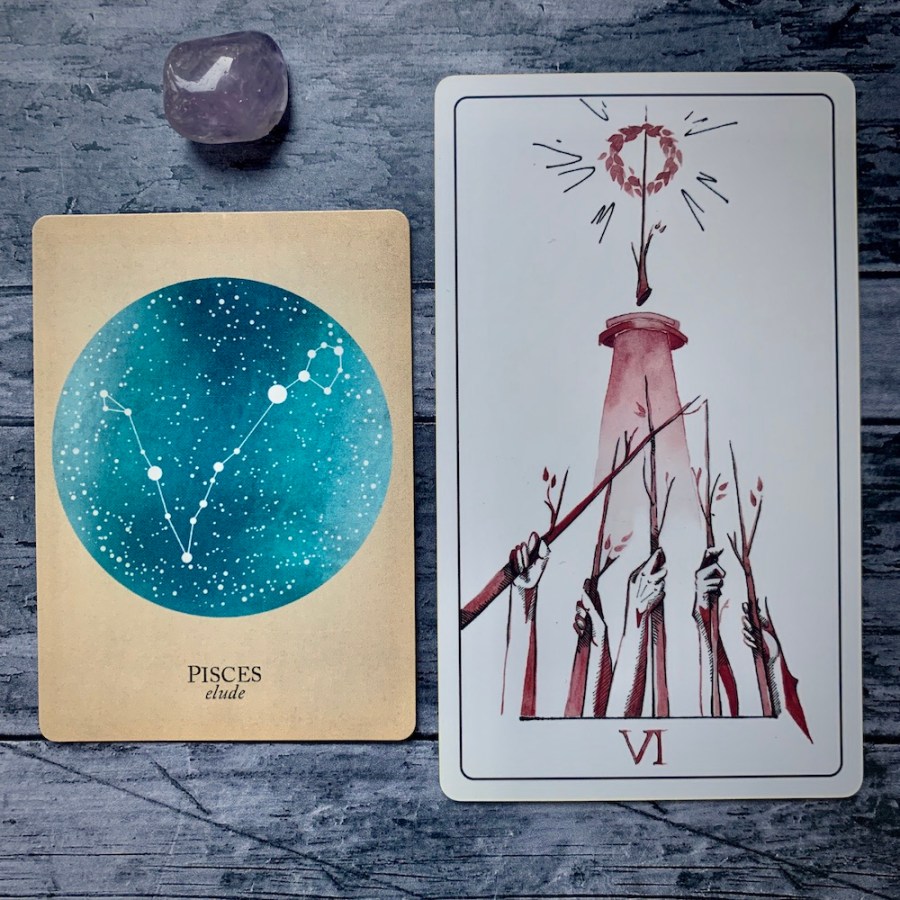 the Pisces card from the Constellations deck and the Six of Wands card