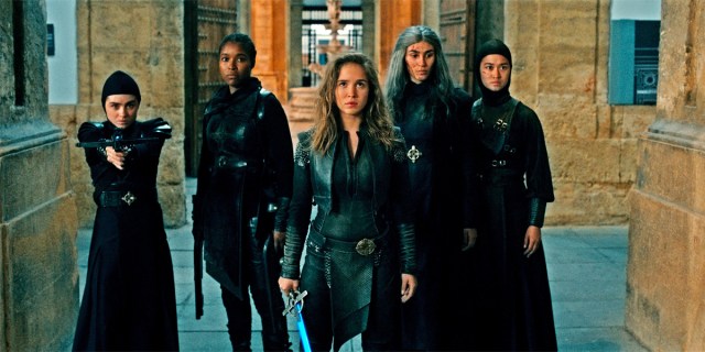 The cast of Warrior Nun preparing to fight a demon.