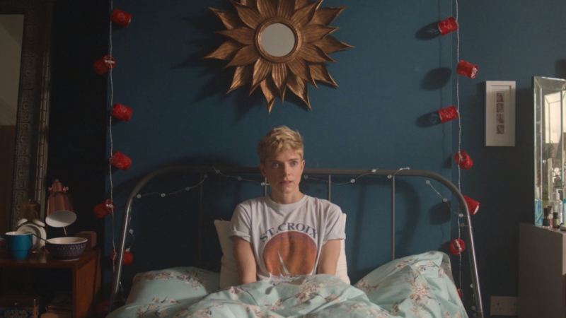still of Mae in bed on Feel Good