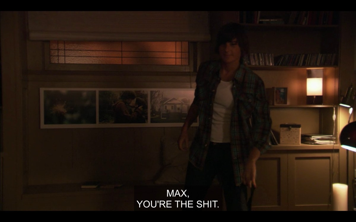 Max in a tank top and flannel entering the room, Jenny says "Max, you're the shit"