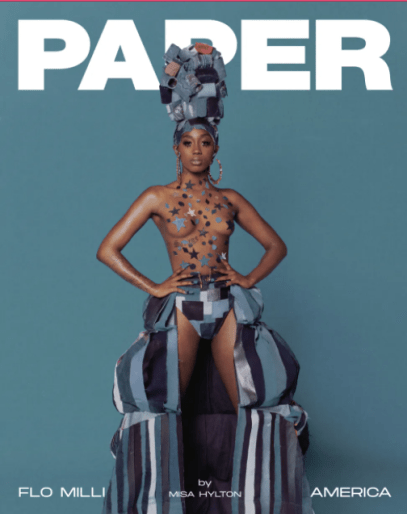 Rapper Flo Milli on the cover of PAPER magazine posing in a hat made of denim, cutout denim long skirt and shapes cut out of denim material over her upper body.
