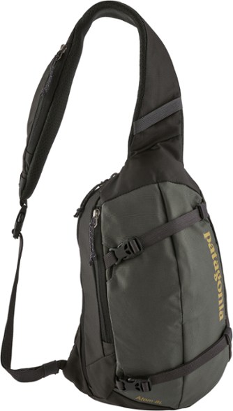 A black over-the-shoulder bag that reads, "Patagonia"