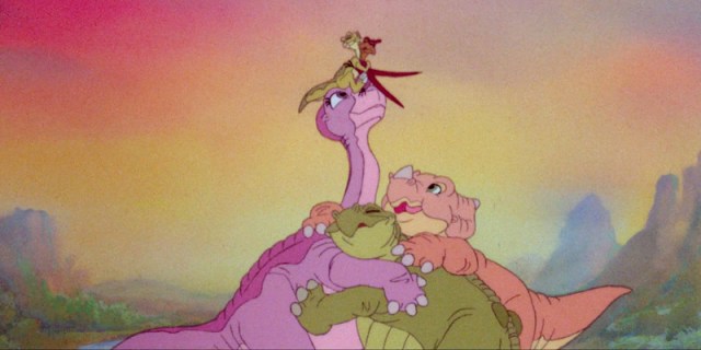 The dinosaurs in The Land Before Time hug at the end of the movie after they make it to the Great Valley.