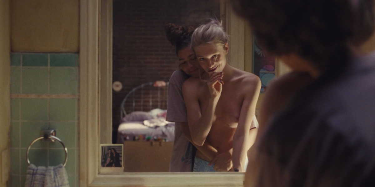 Rue and Jules embrace in front of the mirror on Euphoria. 