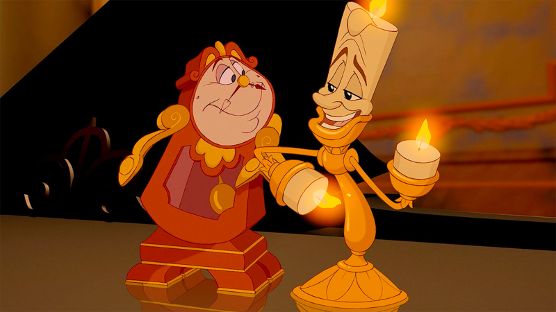 Bisexual Disney characters Lumiere and Cogsworth hug it out. 