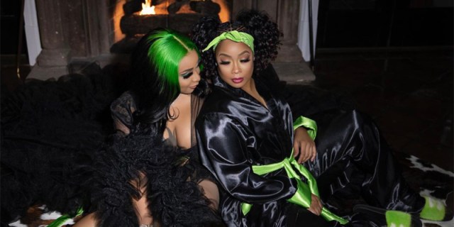 Da Brat celebrates the holidays in front of the fire with her partner.