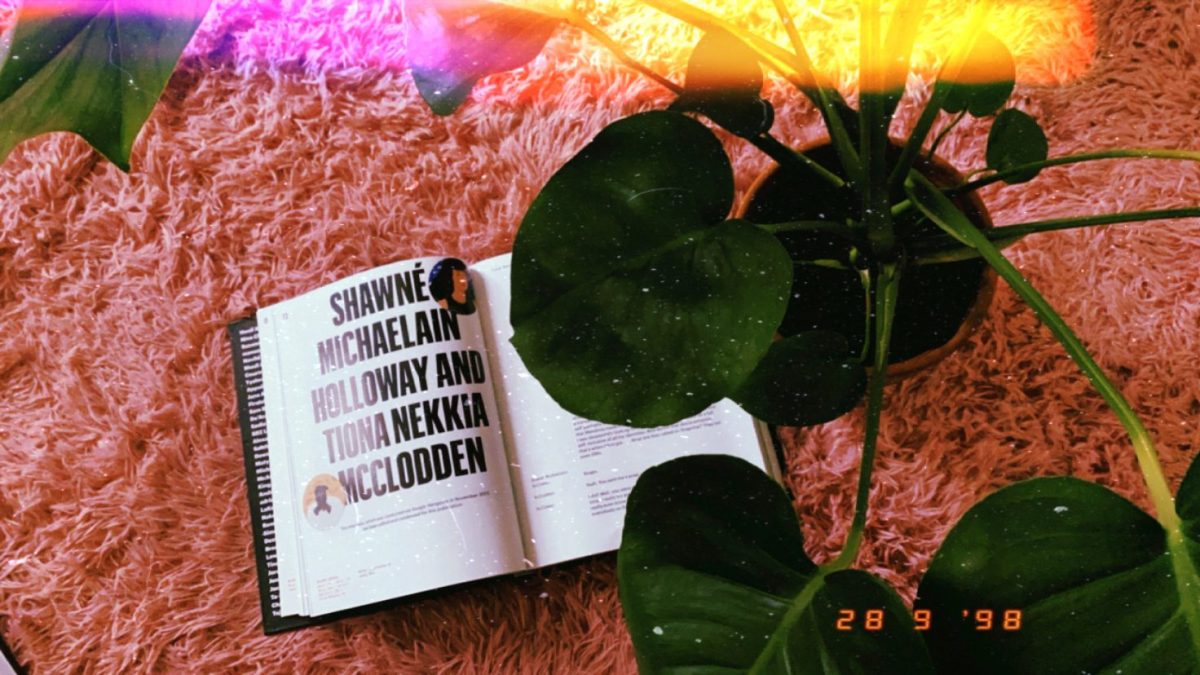 Image shows an excerpt from the book "Black Futures" where a conversation is held between Shawne Michaelain Holloway & Tiona Nekkia McClodden. There is a plant in the frame.