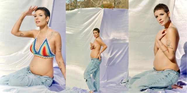 The singer Halsey is posing in a rainbow bikini top and low, loose jeans — showing off her baby bump. She has a low brunette buzzcut.