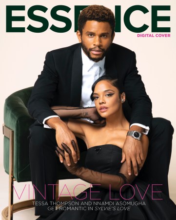 Image shows the cover of Essence magazine where two black actors are pictured in black tie style outfits and sitting in a velvet chair.