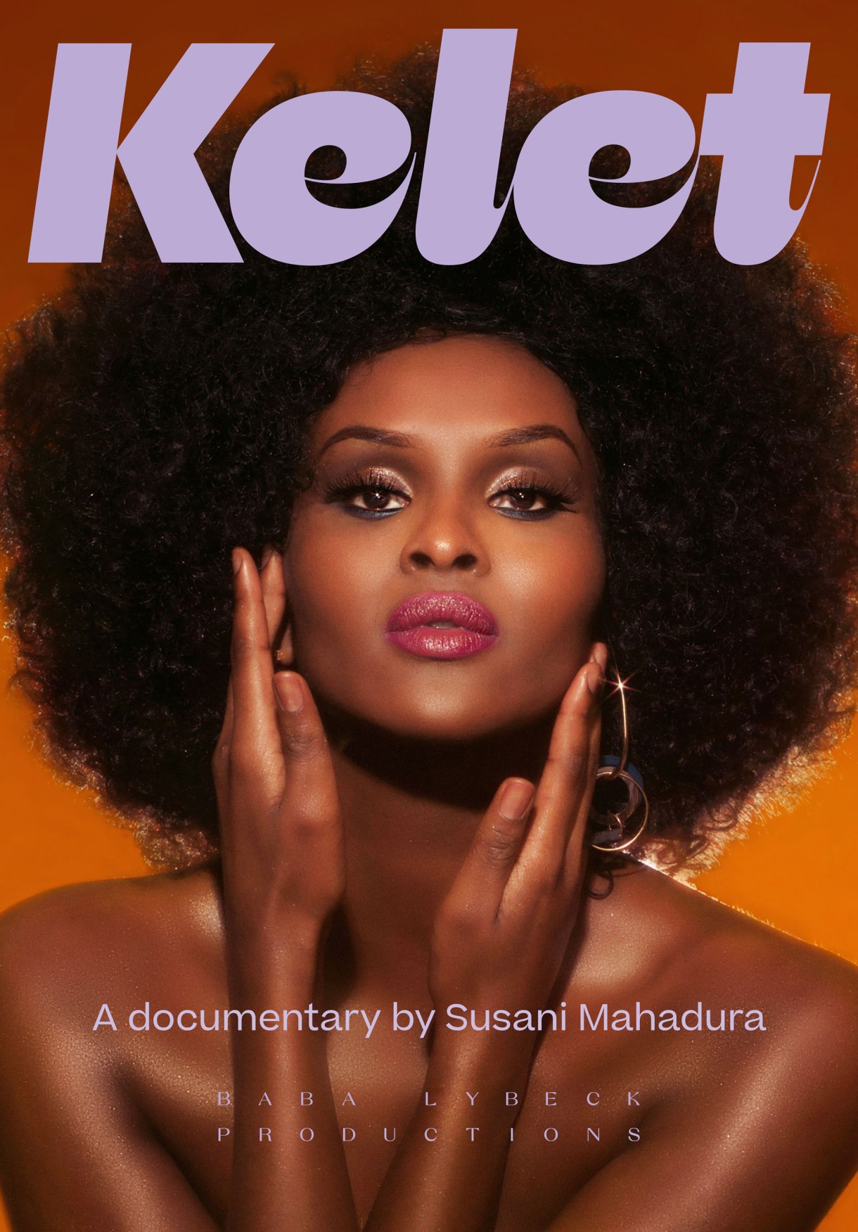 Image shows a beautiful black dark skinned woman with flawless makeup and a large afro staring into the camera. Her shoulders are bare and her hands are softly framing her face. Purple text reading "Kelet" is above her.