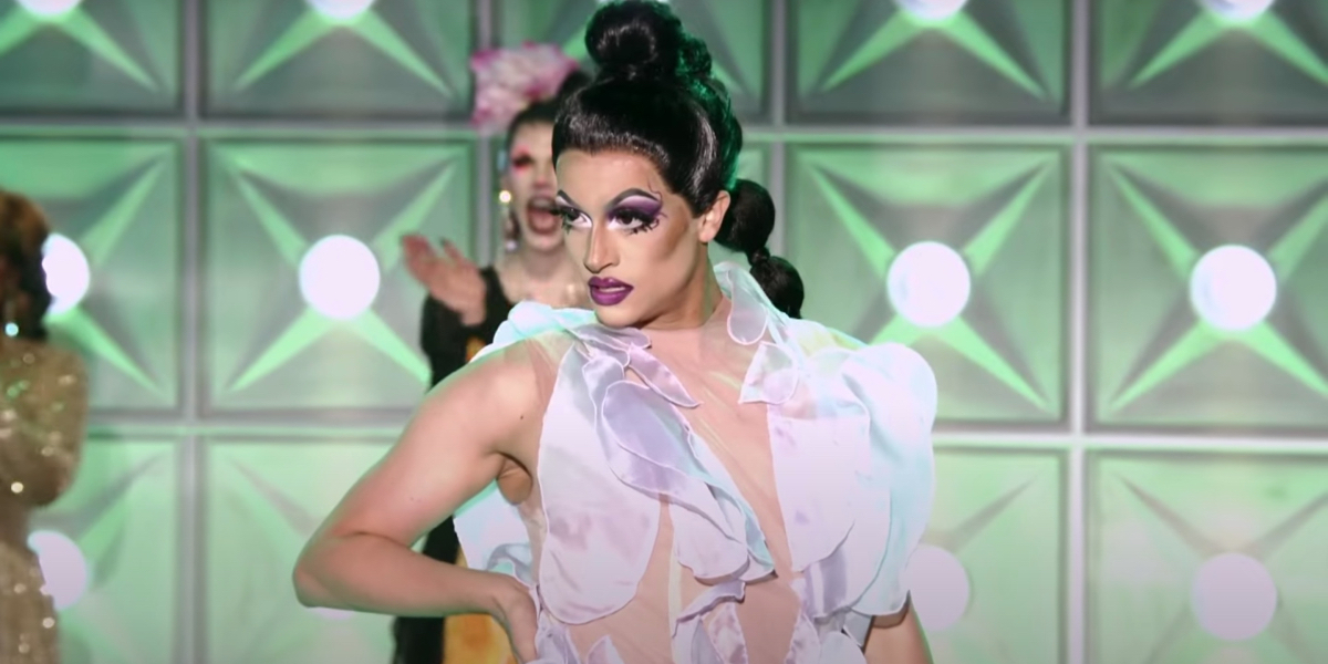 Denali stuns in a see-thru ice blue dress with an incredibly low v neck line.