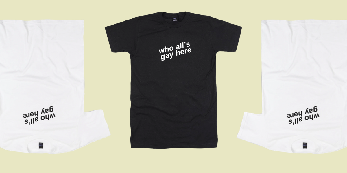 A trio of Who All's Gay Here tees — the design is diagonal text is arial bold and italic. 