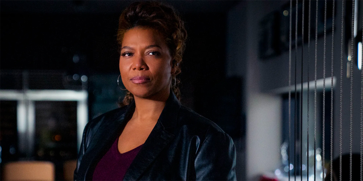 Queen Latifah wears a leather jacket and looks like a badass in a promo photo for CBS' Equalizer.
