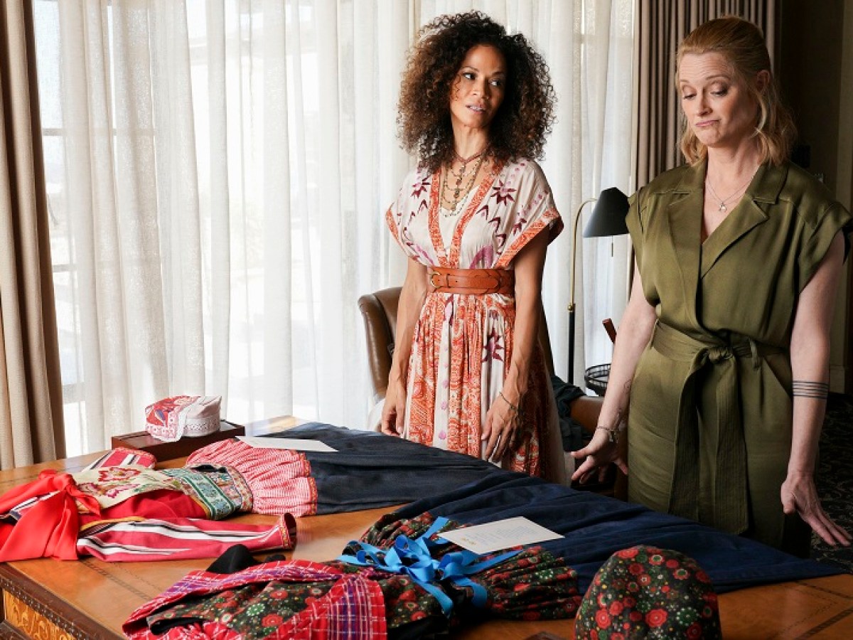 Stef and Lena take a look at their outfits for the night's festivities.