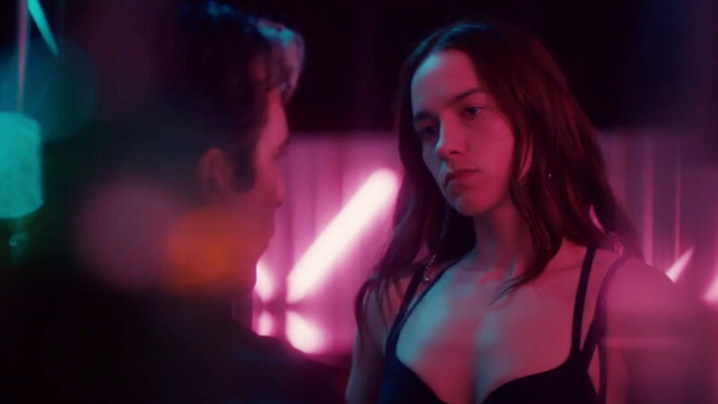 Wynonna Earp bares her bra-clad chest to Amon, a "fight me or fuck me" look on her face.