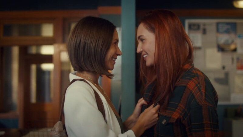 Waverly smiles and tugs gently at the front of Nicole's flannel, Nicole smiles back but doesn't lean into Waverly's silent request.