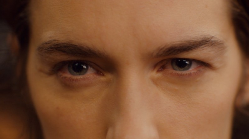 Close-up of Wynonna's eyes narrowed in preparation to fight