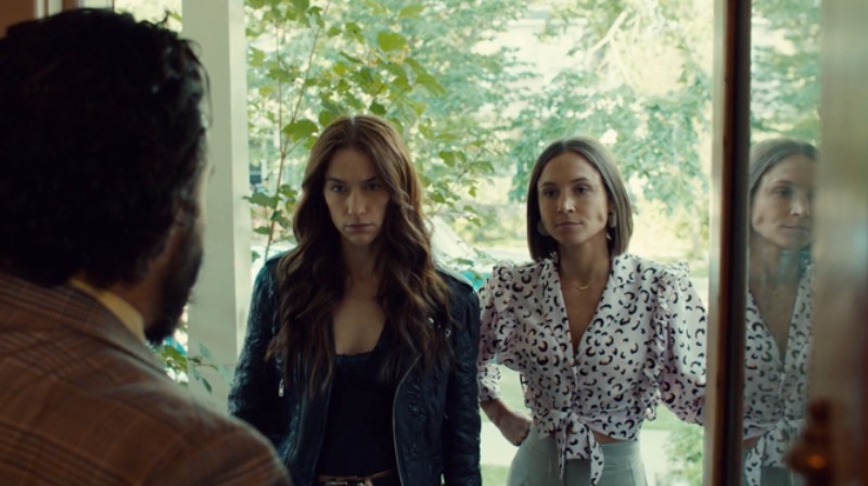 Waverly and Wynonna try to look Serious as Doug answers the door